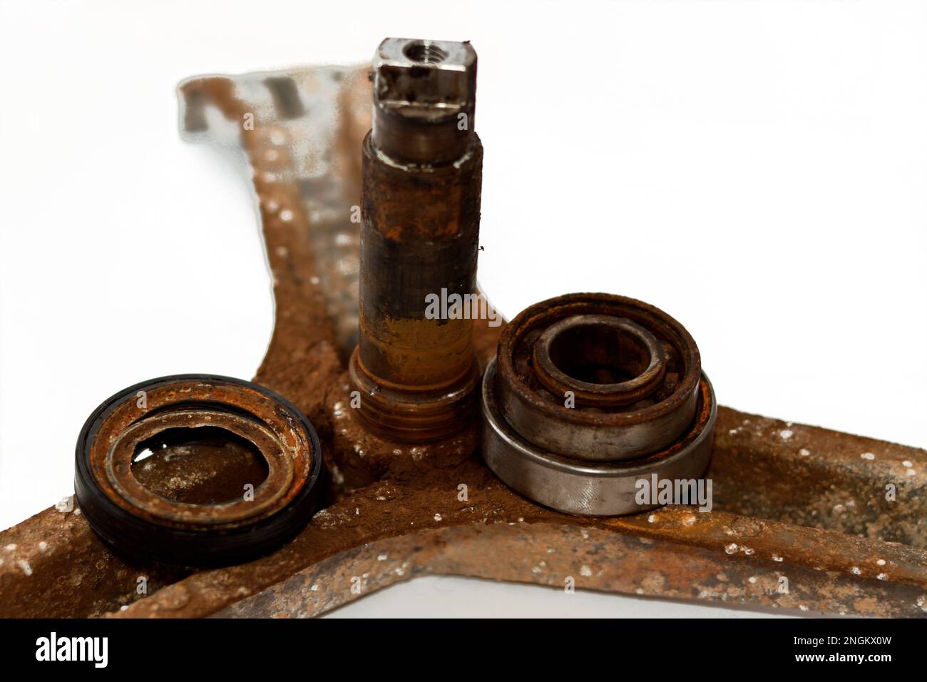 Rusty old dirty automatic electric washing machine drum spider and ball