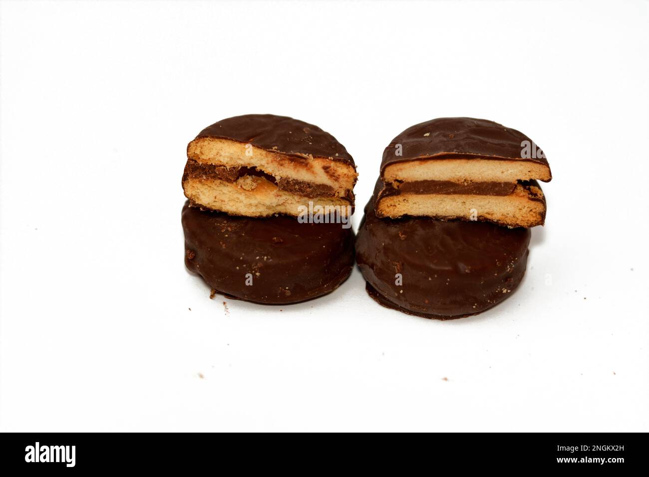 Biscuits filled and coated with natural chocolate, weight gain concept ...