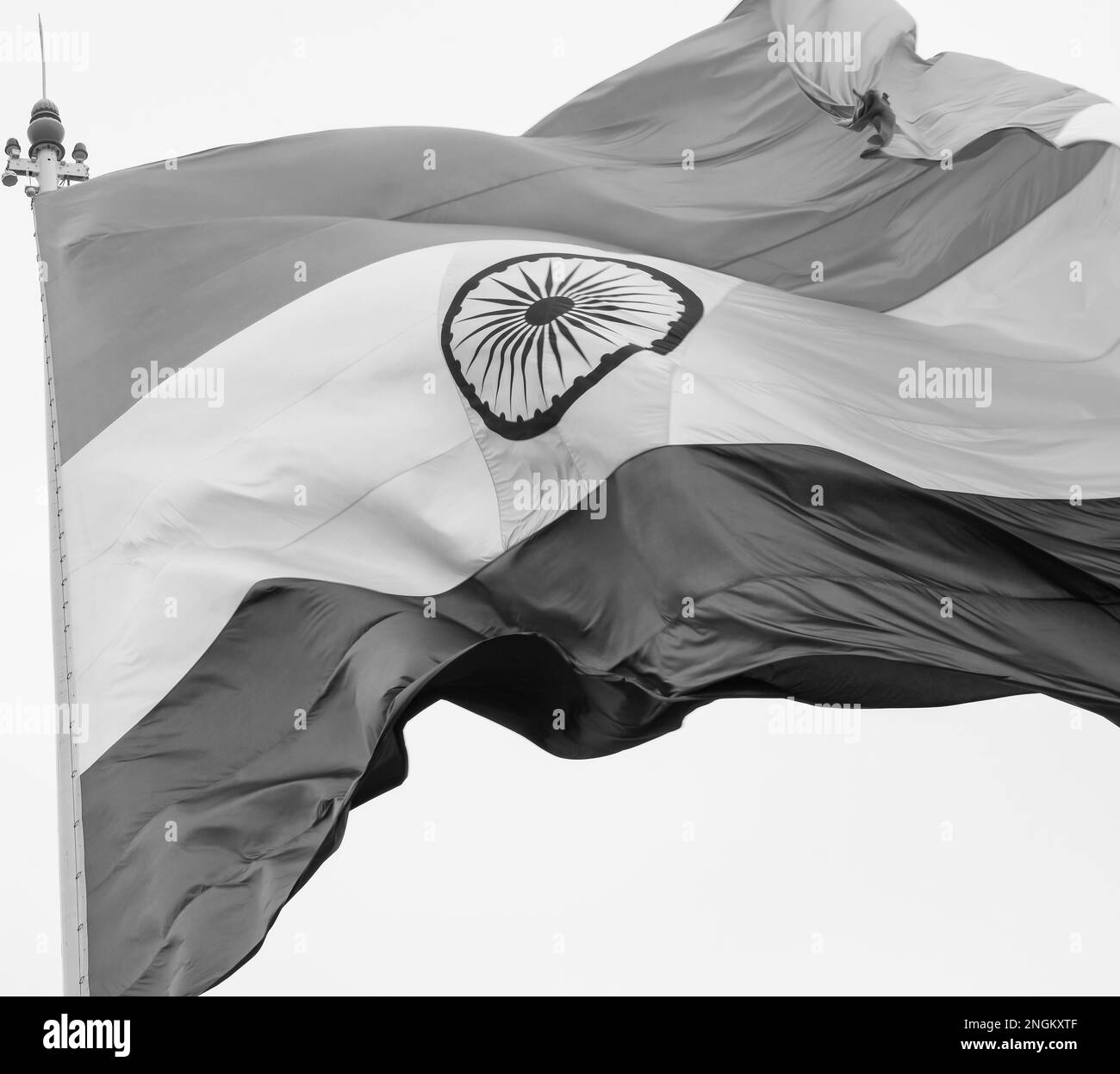 India flag flying high at Connaught Place with pride in blue sky, India