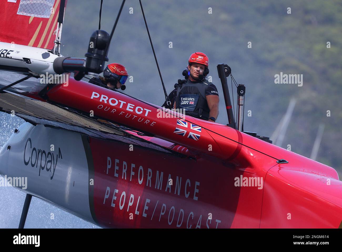 Sydney Harbour, Sydney, Australia. 18th Feb, 2023. 2023 KPMG Australia Sail Grand Prix Day 1; Team Great Britain crew Nick Hutton, trimmer/grinder works to keep the yacht upright Credit: Action Plus Sports/Alamy Live News Stock Photo