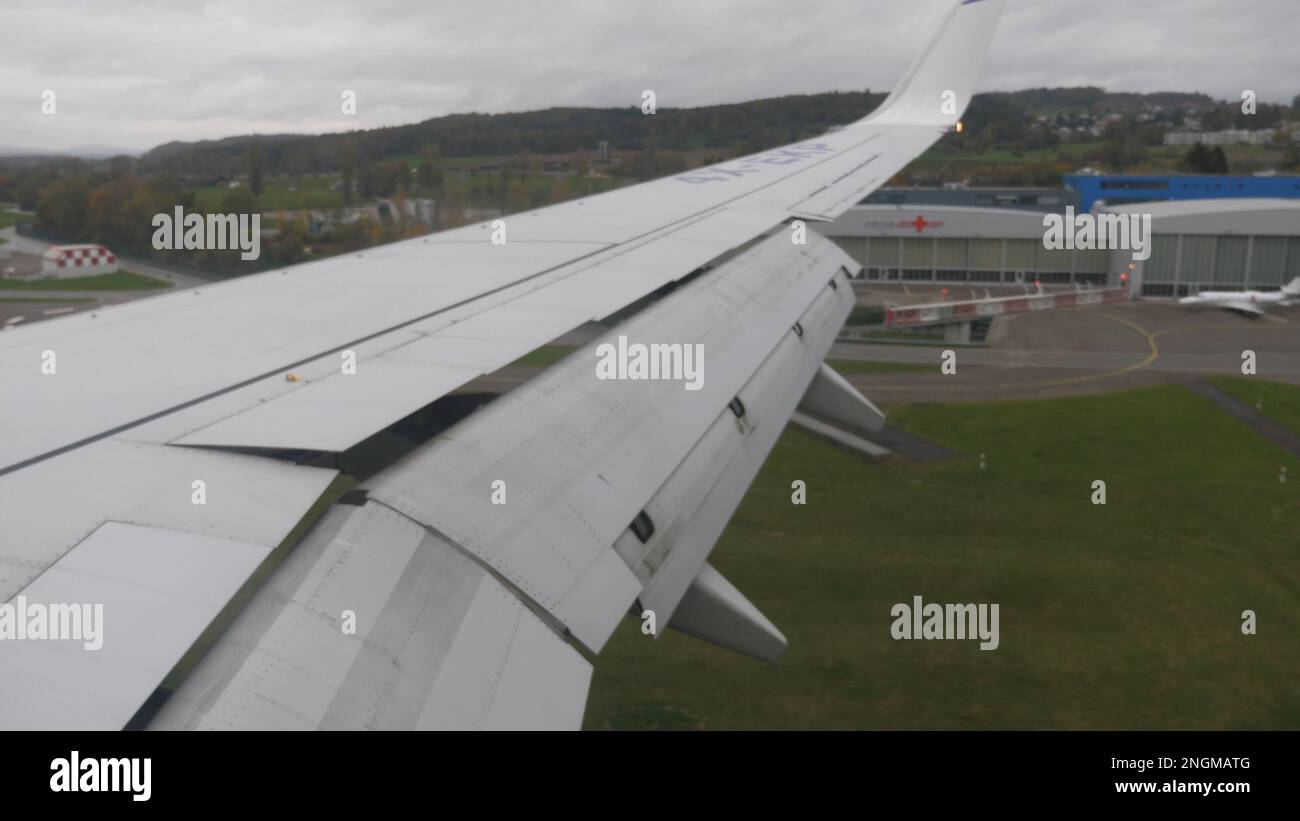 airplane flaps open and close during take off and landing Stock Photo ...