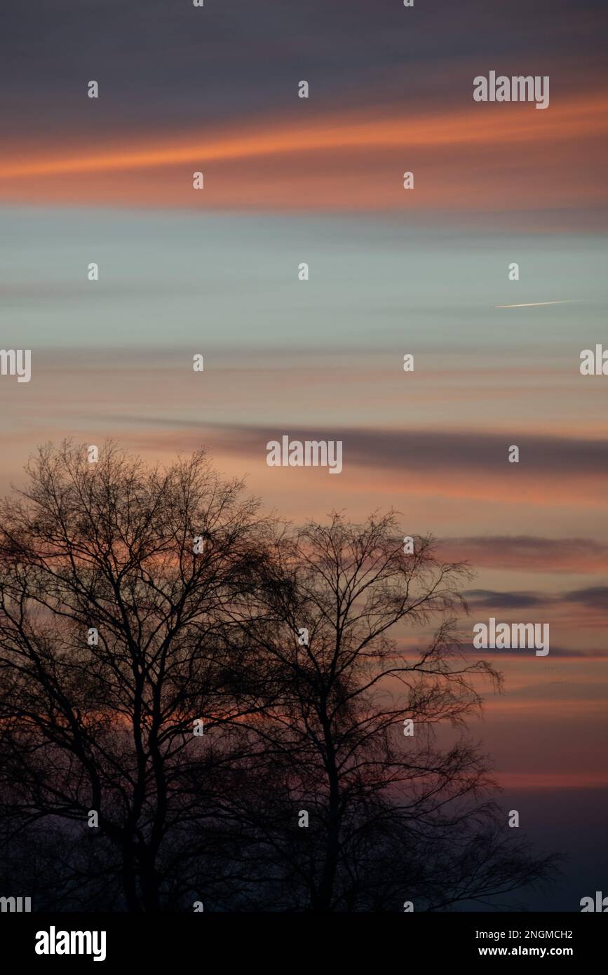 Muted orange and teal pastel sky with copy space Stock Photo