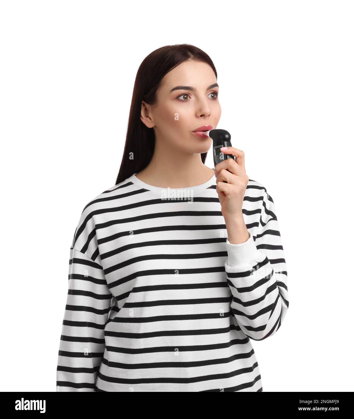 Woman blowing into breathalyzer on white background Stock Photo Alamy
