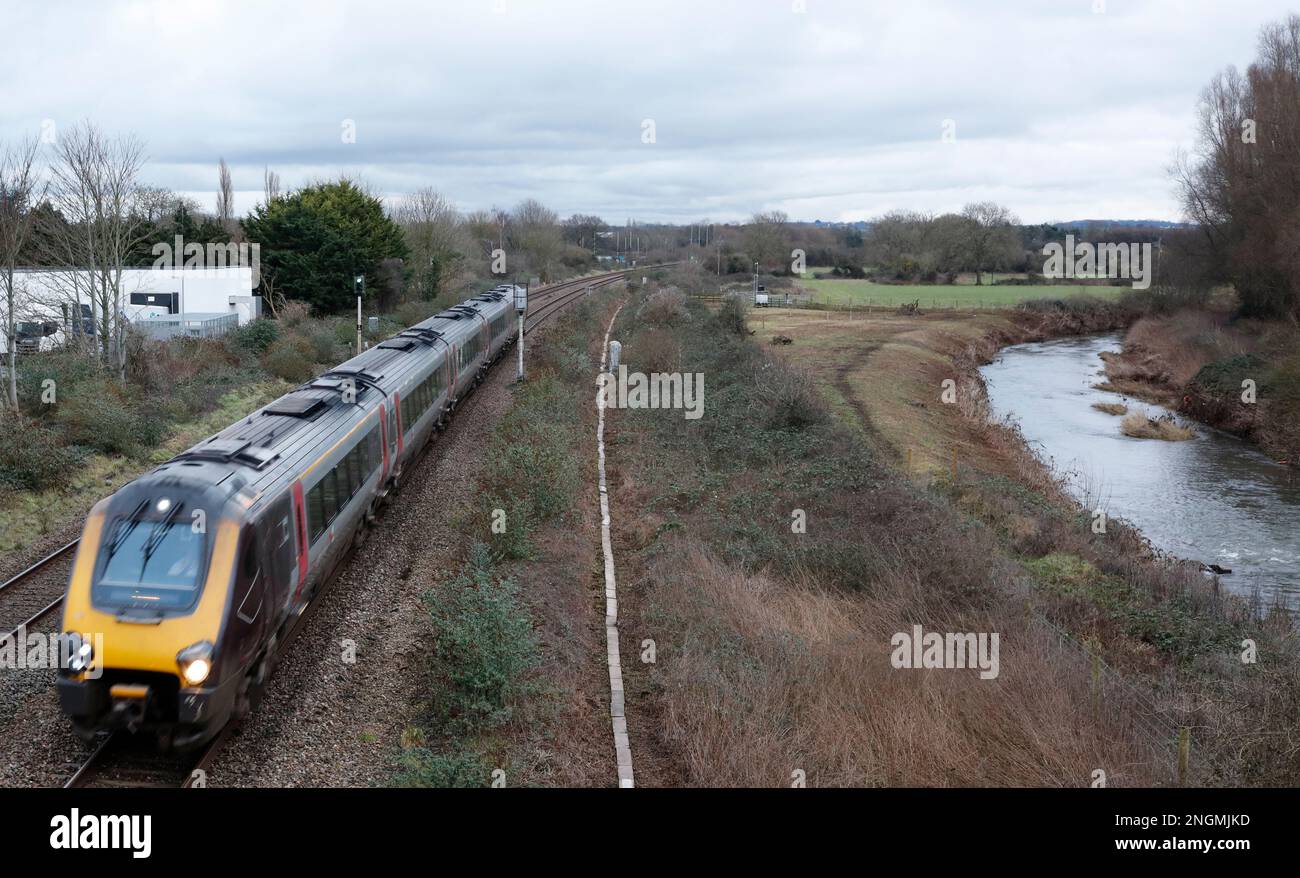 Crosscountry train approaching Taunton at the River Tone, Bathpool