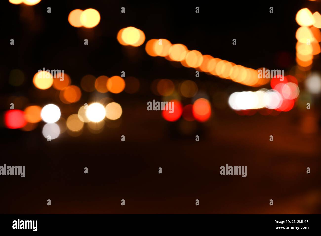 Blurred view of road with cars at night. Bokeh effect Stock Photo - Alamy