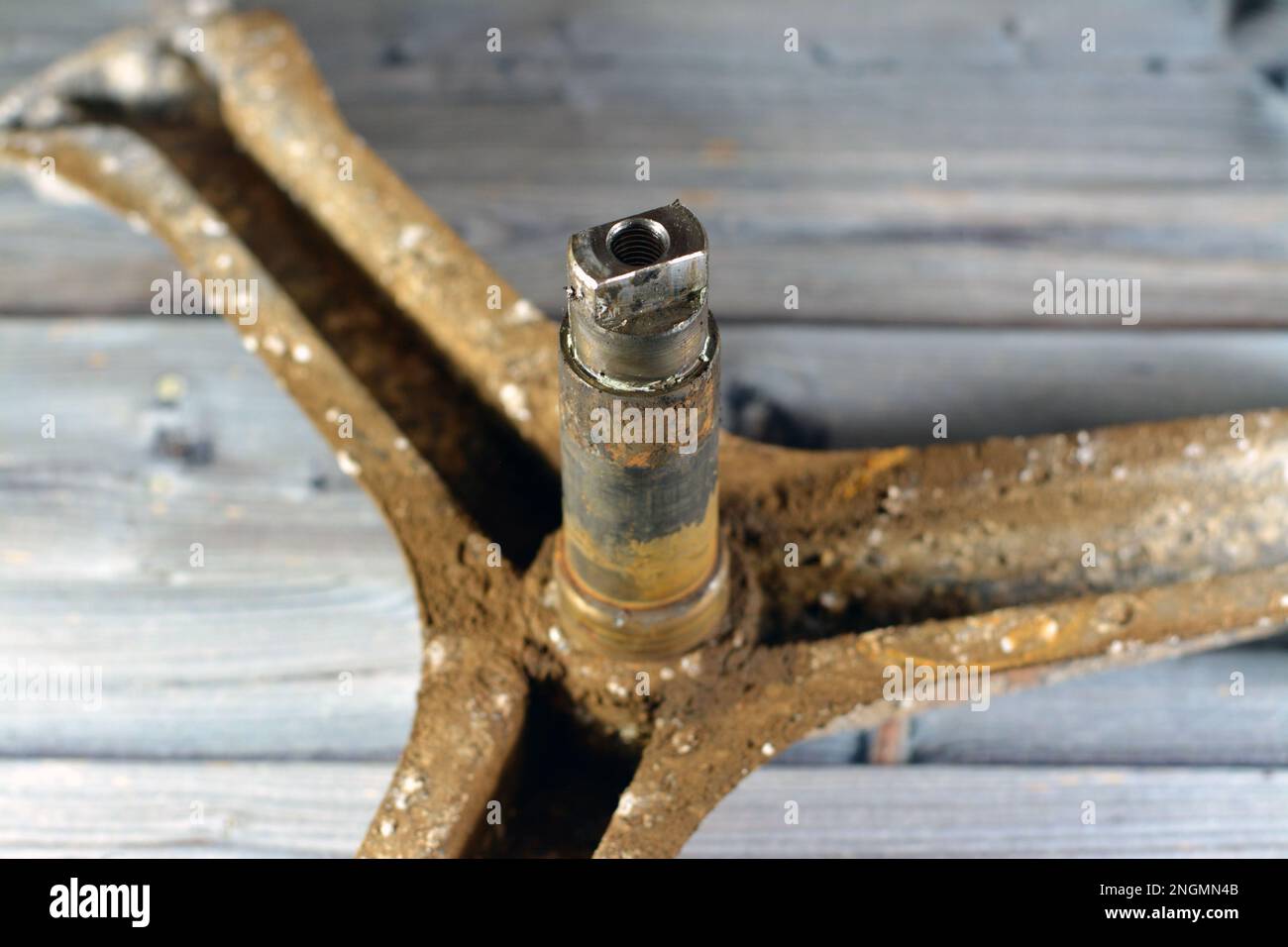 Rusty old dirty automatic electric washing machine drum spider that was