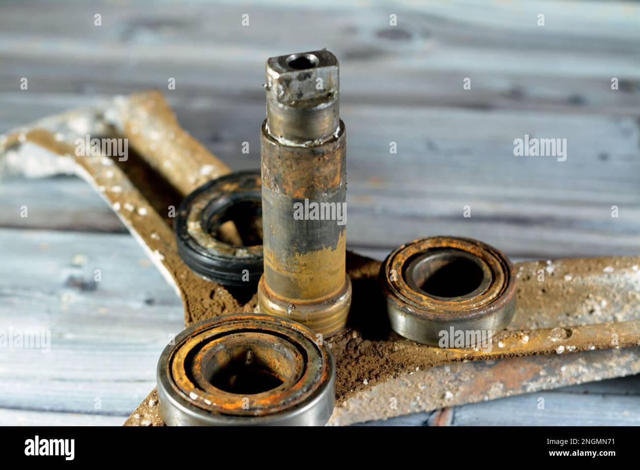 Rusty old dirty automatic electric washing machine drum spider and ball