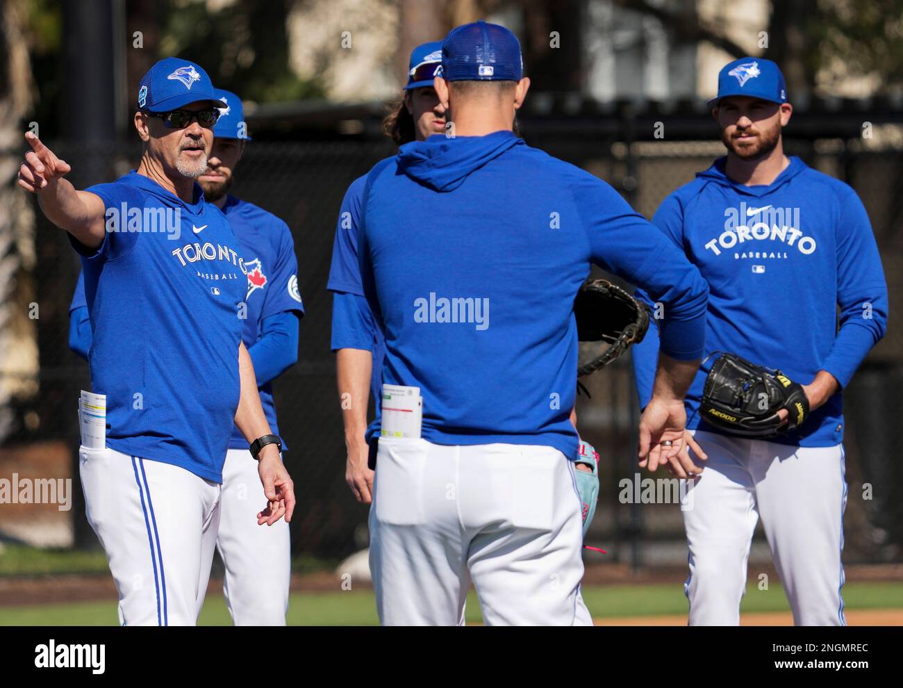 Toronto Blue Jays pitching coach Pete Walker, left, talks with his