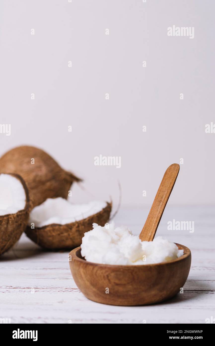 vertical shot bowl with coconut oil. High resolution photo Stock Photo