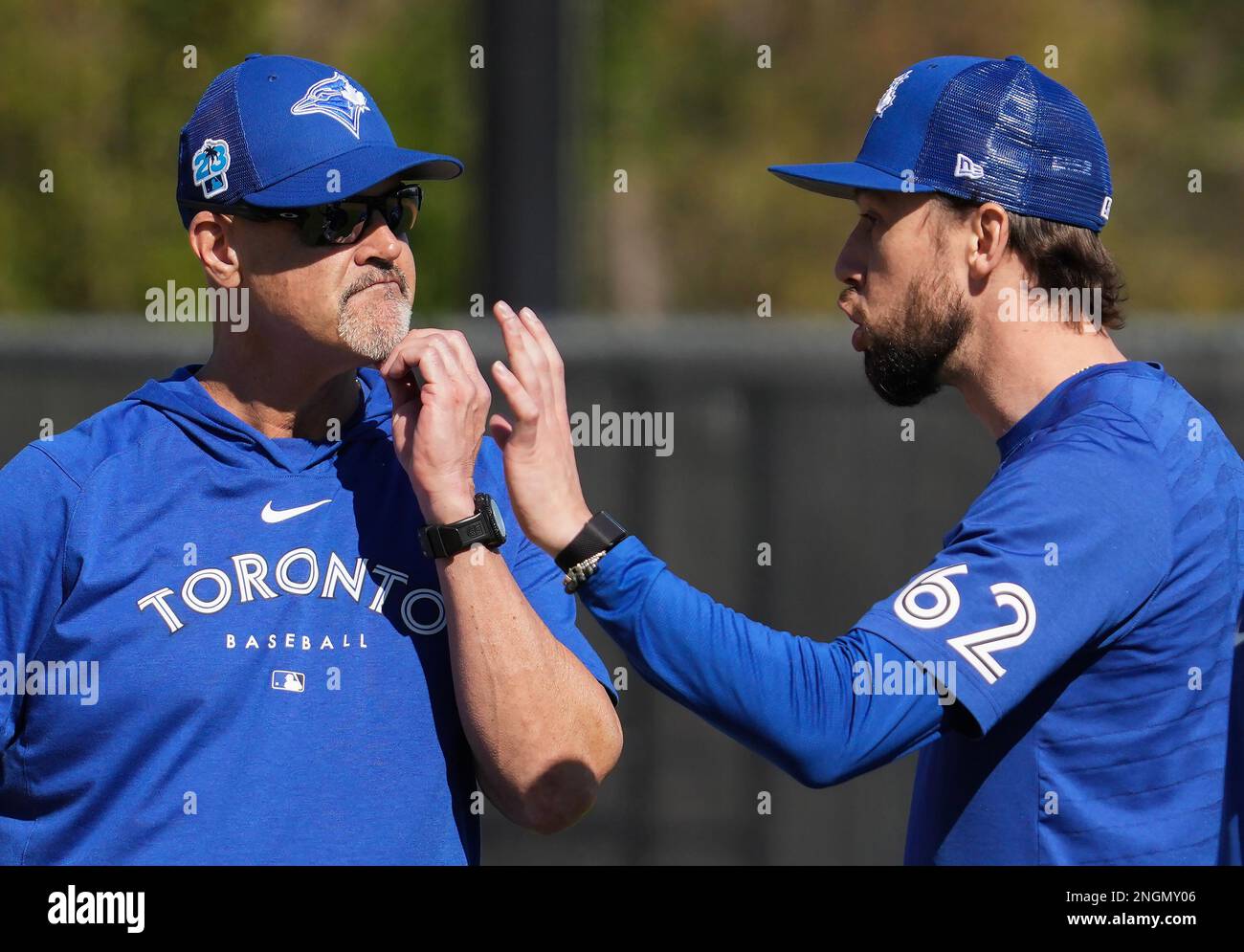 Toronto Blue Jays pitcher Casey Lawrence, right, talks with pitching