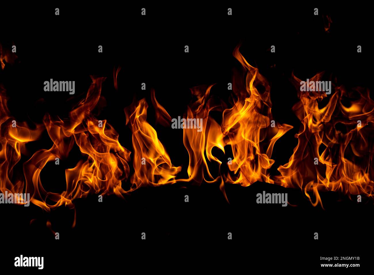 Flame fires. Burn lights on a black background. Fire flames on black