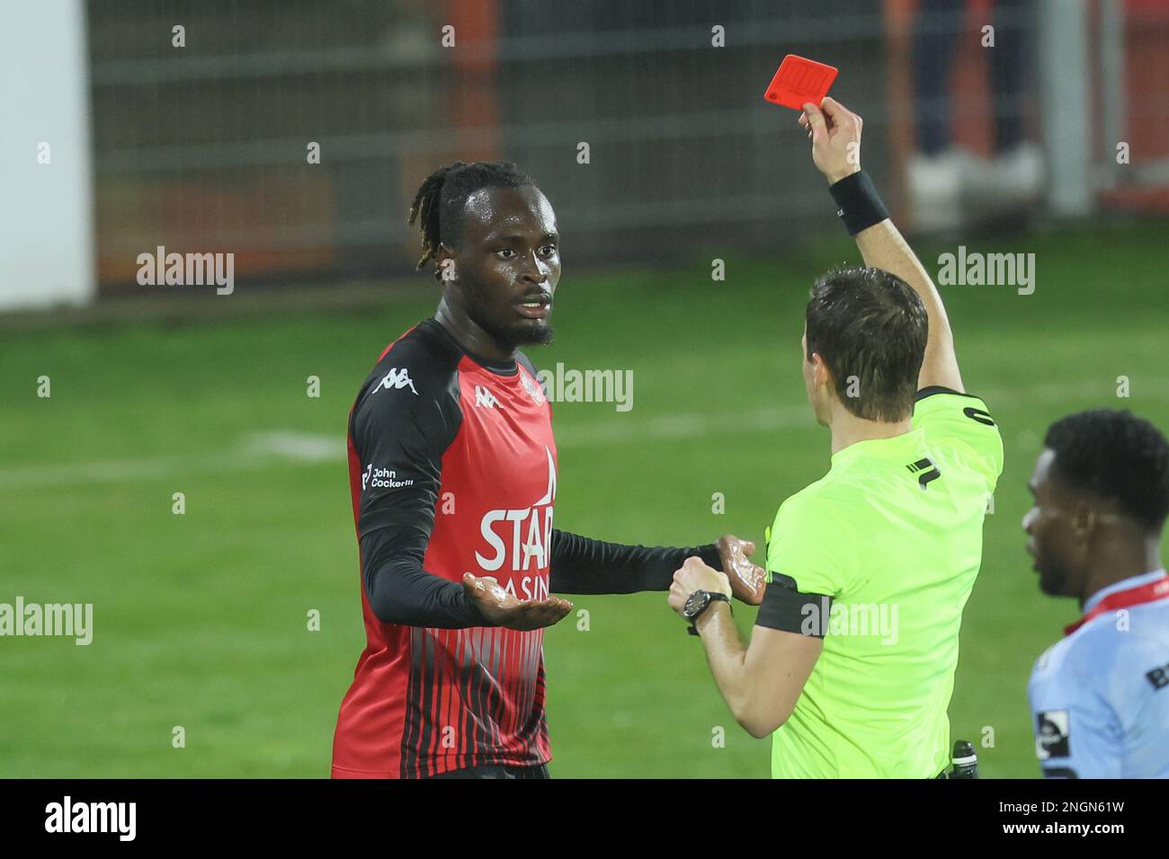 Seraing's Marvin Silver Tshibuabua receives a red card from the referee during a soccer match between RFC Seraing and SV Zulte Waregem, Saturday 18 February 2023 in Seraing, on day 26 of the 2022-2023 'Jupiler Pro League' first division of the Belgian championship. BELGA PHOTO BRUNO FAHY Stock Photo