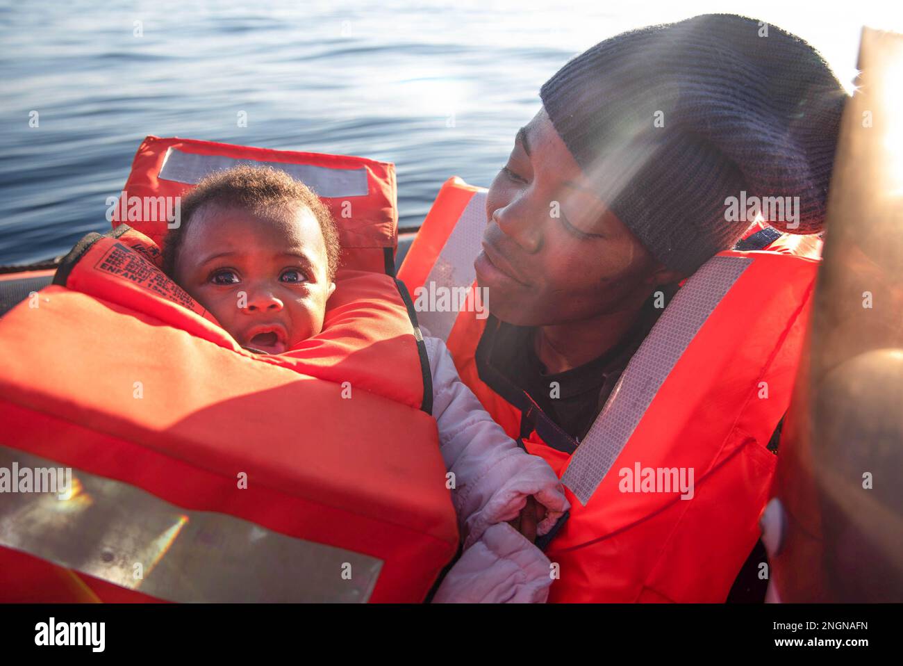A mother and her 3-month-old baby minutes seen after being taken to safety  in an SMH rescue boat in SAR Malta. On Wednesday 15 February at around  15:00 hrs the rescue vessel