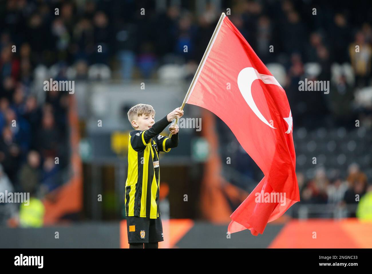 A flag bearer waves a Turkish flag during the Sky Bet Championship