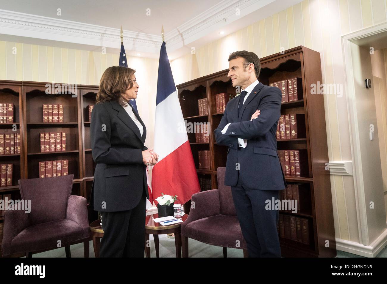 Munich, Germany. 18th Feb, 2023. U.S Vice President Kamala Harris, left, chats with French President Emmanuel Macron on the sidelines at the Munich Security Conference at the Bayerischer Hof Hotel February 18, 2023 in Munich, Germany. Credit: Lawrence Jackson/White House Photo/Alamy Live News Stock Photo