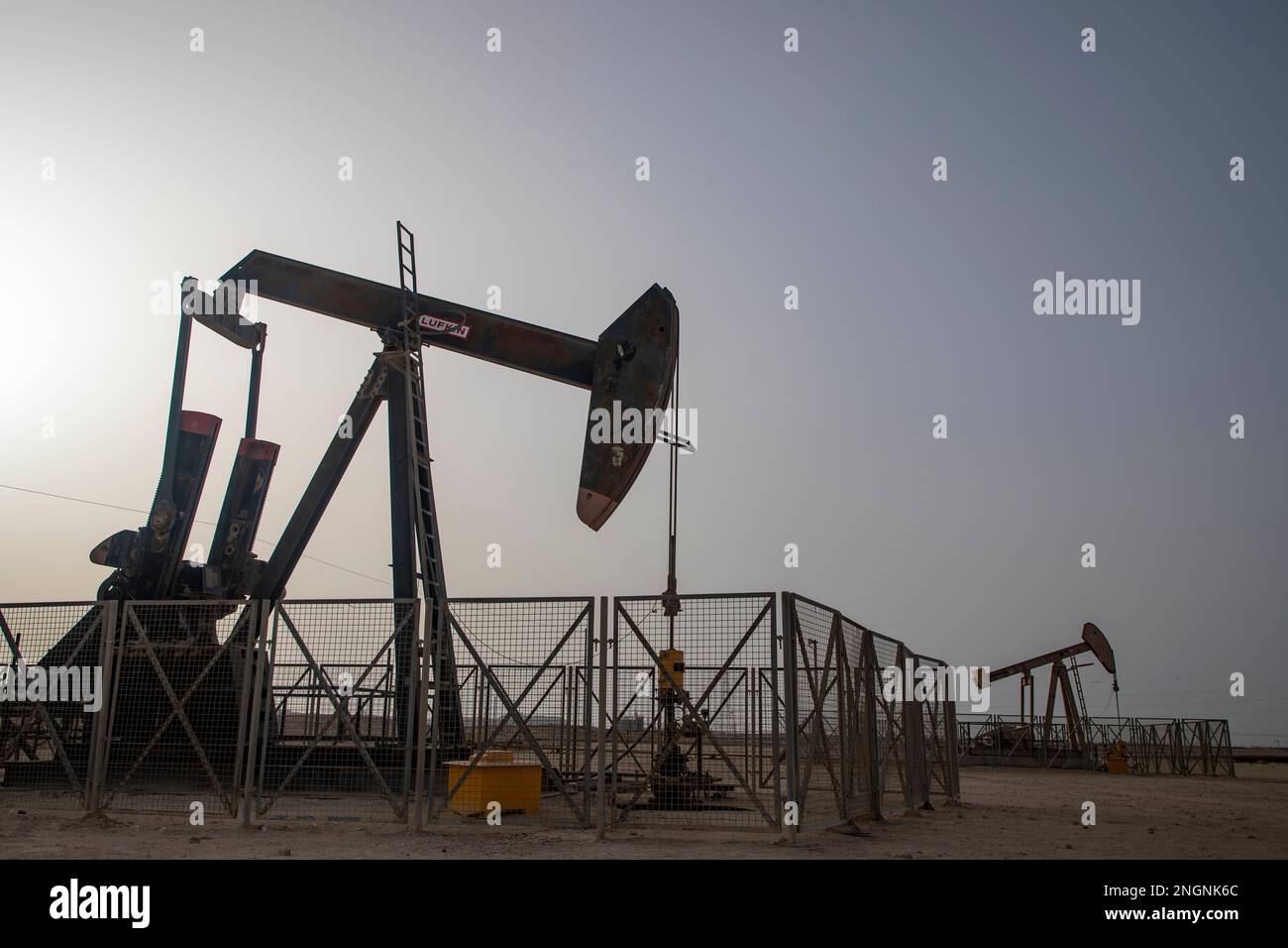 Pumpjack aka oil horse, nodding donkey, oil jack, beam pump raises