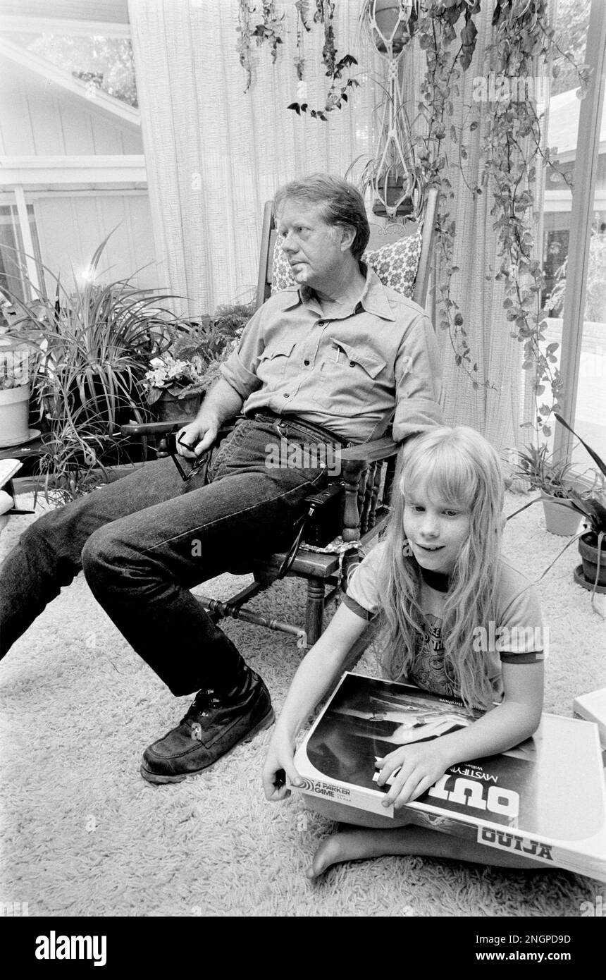 Jimmy Carter, wife Rosalynn and daughter Amy Carter at home in their Plains, Georgia ranch style house. Carter, who went from peanut farmer to President of the United States built the modest home in the woods in 1961 and the couple has called it their primary residence since - with the exception of 1600 Pennsylvania Avenue for four years, Stock Photo