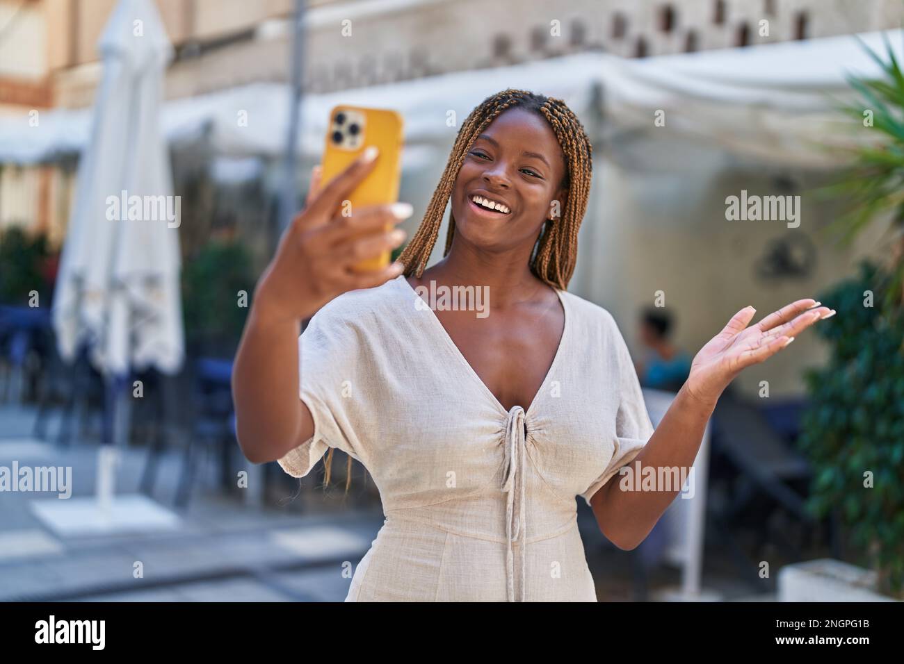 African american woman smiling confident having video call at coffee ...