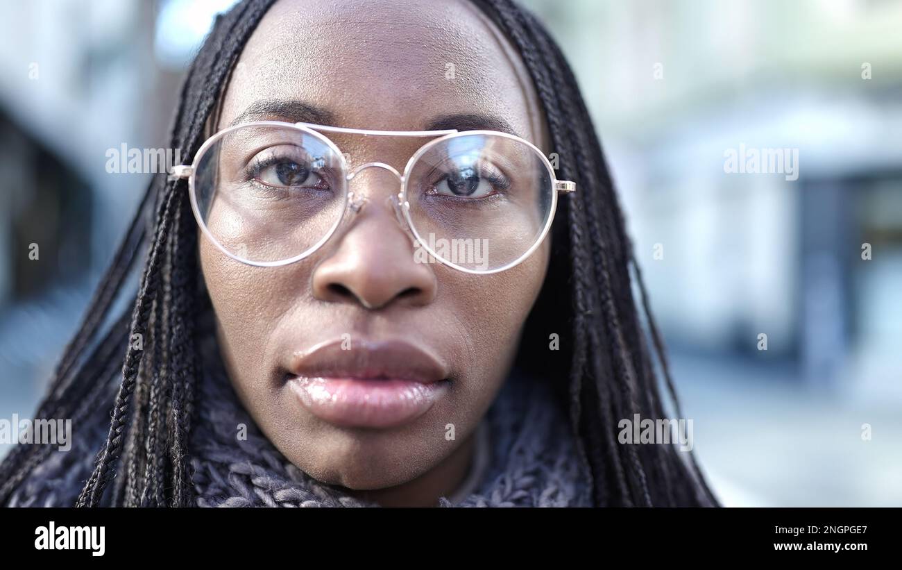Woman wearing glasses braids hi-res stock photography and images - Alamy