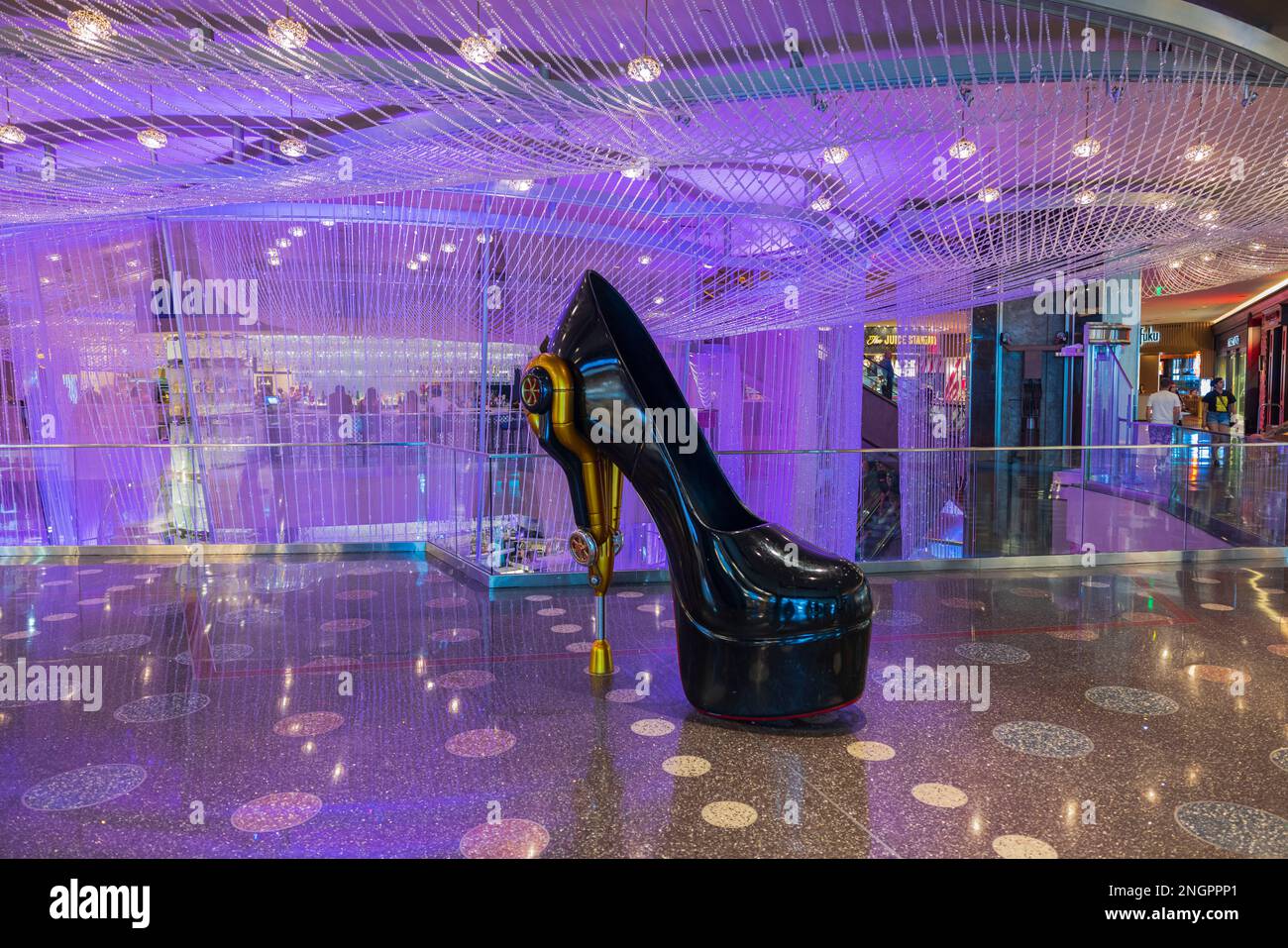 Beautiful interior view of Cosmopolitan. Giant black high heel shoe as