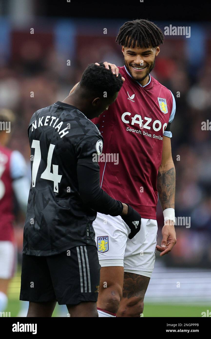 Birmingham, UK. 18th Feb, 2023. Tyrone Mings of Aston Villa jokes with Eddie Nketiah of Arsenal. Premier League match, Aston Villa v Arsenal at Villa Park in Birmingham on Saturday 18th February 2023. this image may only be used for Editorial purposes. Editorial use only, license required for commercial use. No use in betting, games or a single club/league/player publications. pic by Andrew Orchard/Andrew Orchard sports photography/Alamy Live news Credit: Andrew Orchard sports photography/Alamy Live News Stock Photo