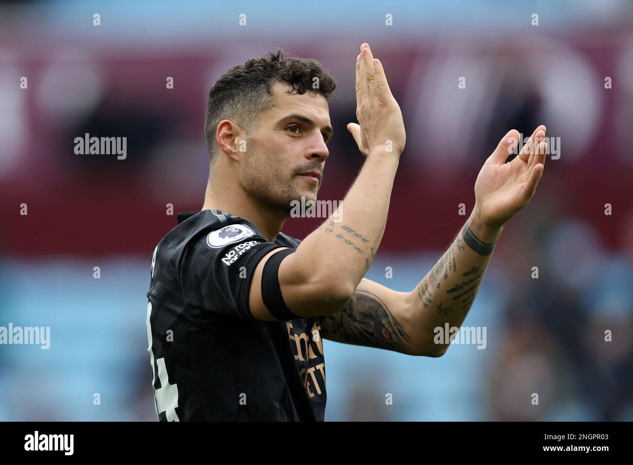 Birmingham, UK. 18th Feb, 2023. Granit Xhaka of Arsenal celebrates after his teams win. Premier League match, Aston Villa v Arsenal at Villa Park in Birmingham on Saturday 18th February 2023. this image may only be used for Editorial purposes. Editorial use only, license required for commercial use. No use in betting, games or a single club/league/player publications. pic by Andrew Orchard/Andrew Orchard sports photography/Alamy Live news Credit: Andrew Orchard sports photography/Alamy Live News Stock Photo