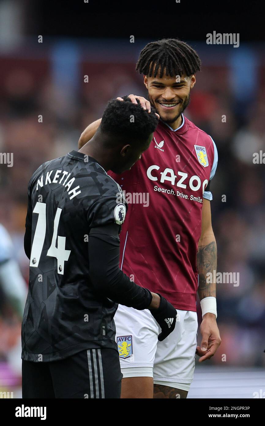 Birmingham, UK. 18th Feb, 2023. Tyrone Mings of Aston Villa jokes with Eddie Nketiah of Arsenal. Premier League match, Aston Villa v Arsenal at Villa Park in Birmingham on Saturday 18th February 2023. this image may only be used for Editorial purposes. Editorial use only, license required for commercial use. No use in betting, games or a single club/league/player publications. pic by Andrew Orchard/Andrew Orchard sports photography/Alamy Live news Credit: Andrew Orchard sports photography/Alamy Live News Stock Photo