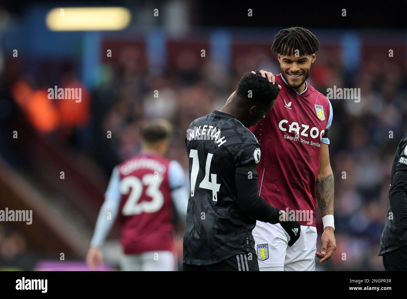 Birmingham, UK. 18th Feb, 2023. Tyrone Mings of Aston Villa jokes with Eddie Nketiah of Arsenal. Premier League match, Aston Villa v Arsenal at Villa Park in Birmingham on Saturday 18th February 2023. this image may only be used for Editorial purposes. Editorial use only, license required for commercial use. No use in betting, games or a single club/league/player publications. pic by Andrew Orchard/Andrew Orchard sports photography/Alamy Live news Credit: Andrew Orchard sports photography/Alamy Live News Stock Photo