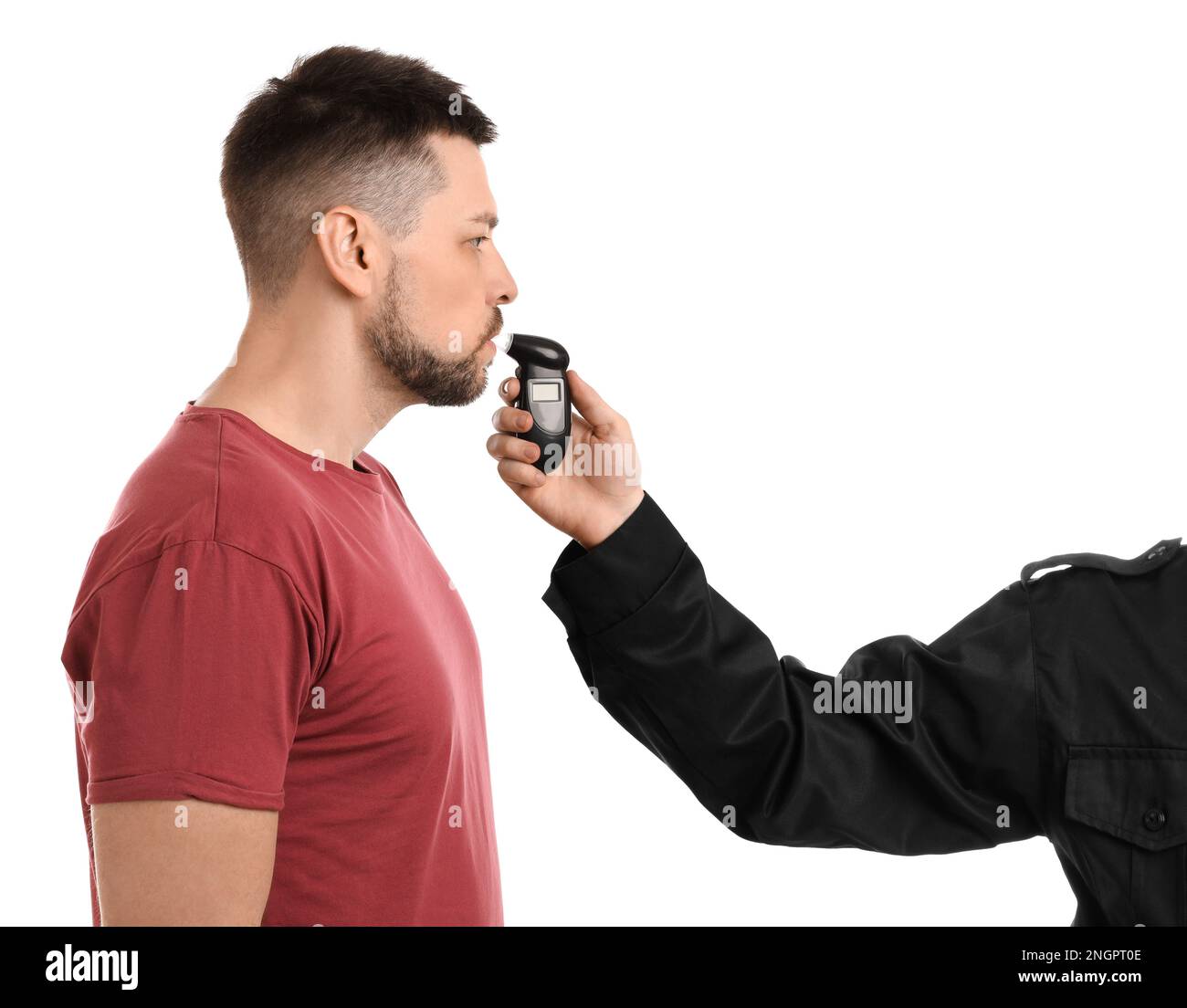 Police inspector conducting alcohol breathe testing, man blowing into