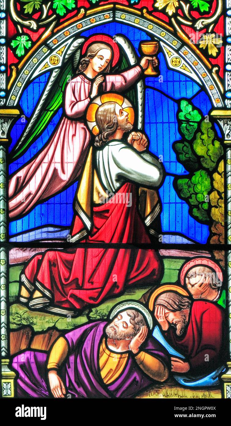Story of Easter, Jesus prays in the Garden of Gethsemane, by Mount of Olives, while Disciples sleep, stained glass window by William Warrington, 1854 Stock Photo
