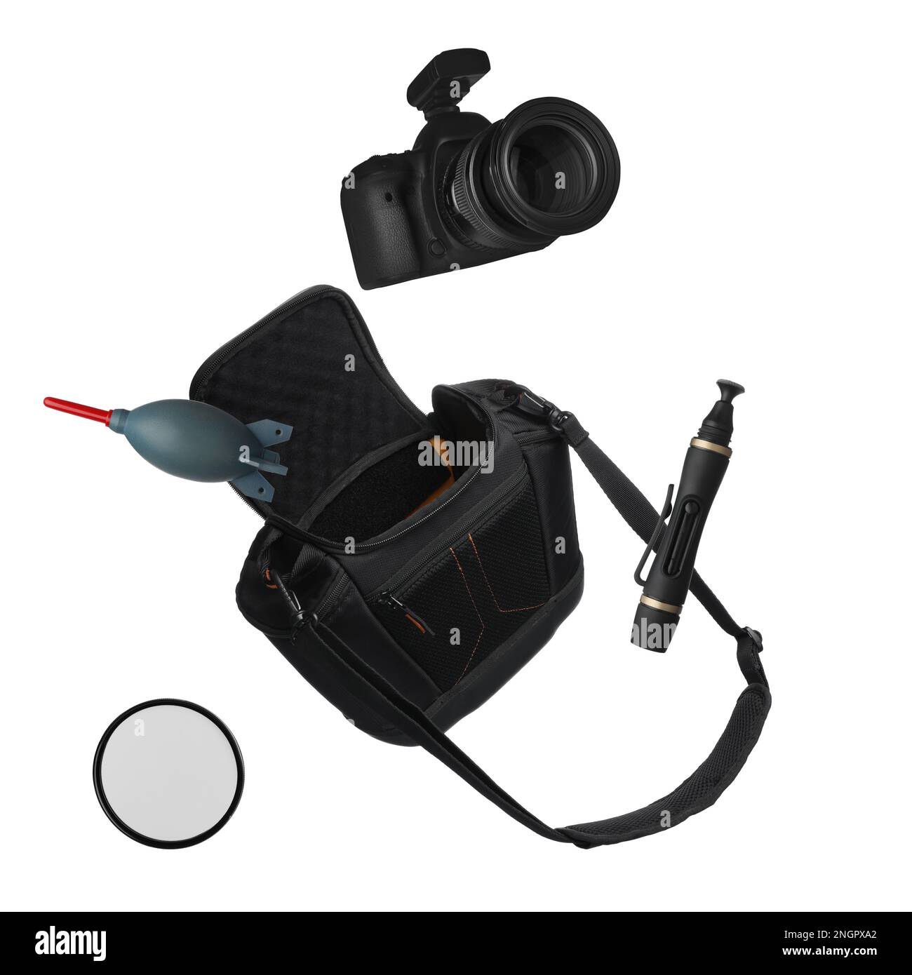 Different professional photography equipment falling on beige