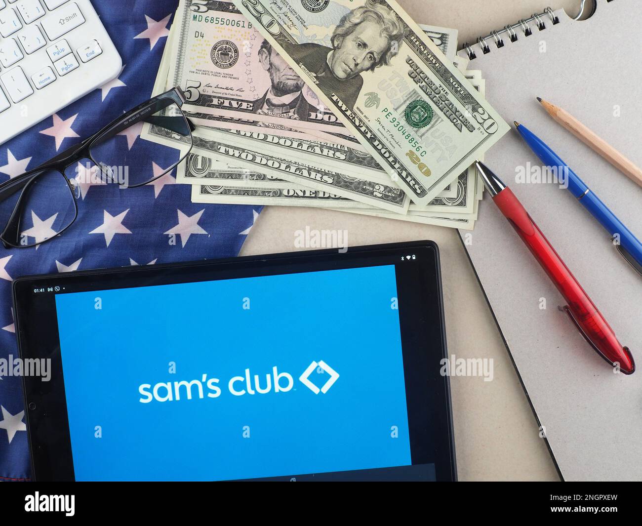 In this photo illustration, Sam’s Club logo seen displayed on a tablet. Stock Photo
