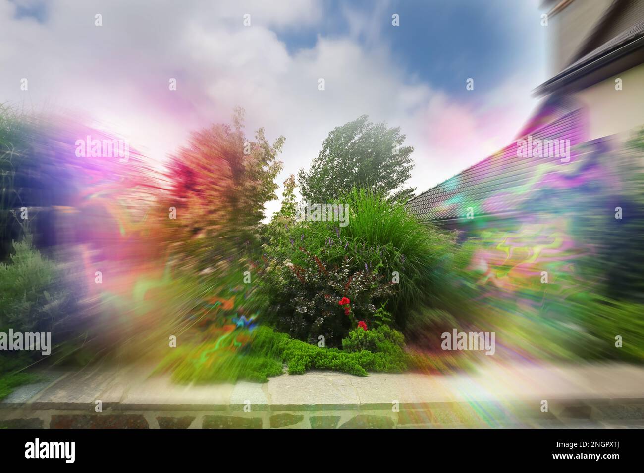 View of garden near house and flashing lights effect. Migraine aura