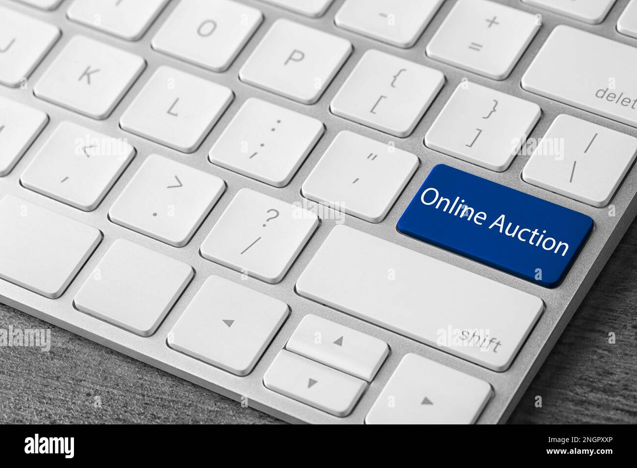 Modern computer keyboard with text Online Auction on button, closeup ...