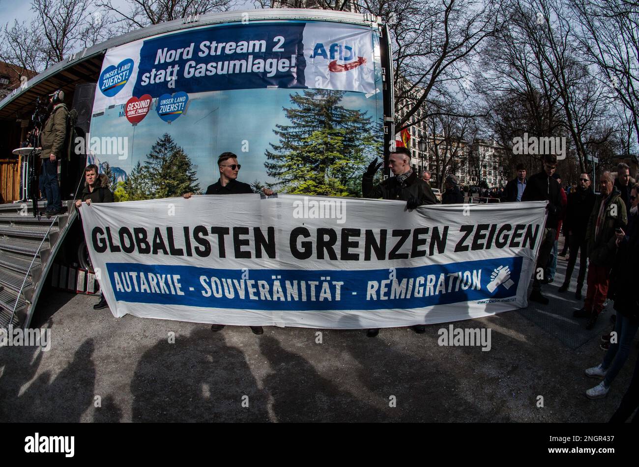 Munich, Bavaria, Germany. 18th Feb, 2023. Identitaere Bewegung and Burschenschaft members at an AfD deno in Munich, Germany. In collaboration with JÃ¼rgen ElsÃ¤sser (Juergen Elsaesser) of the extreme-right Compact Magazine, the Alternative for Germany (Alternative fuer Deutschland) held a demo featuring Petr Bystron and others to protest what they perceive as anti-Putin politics in Germany. (Credit Image: © Sachelle Babbar/ZUMA Press Wire) EDITORIAL USAGE ONLY! Not for Commercial USAGE! Stock Photo