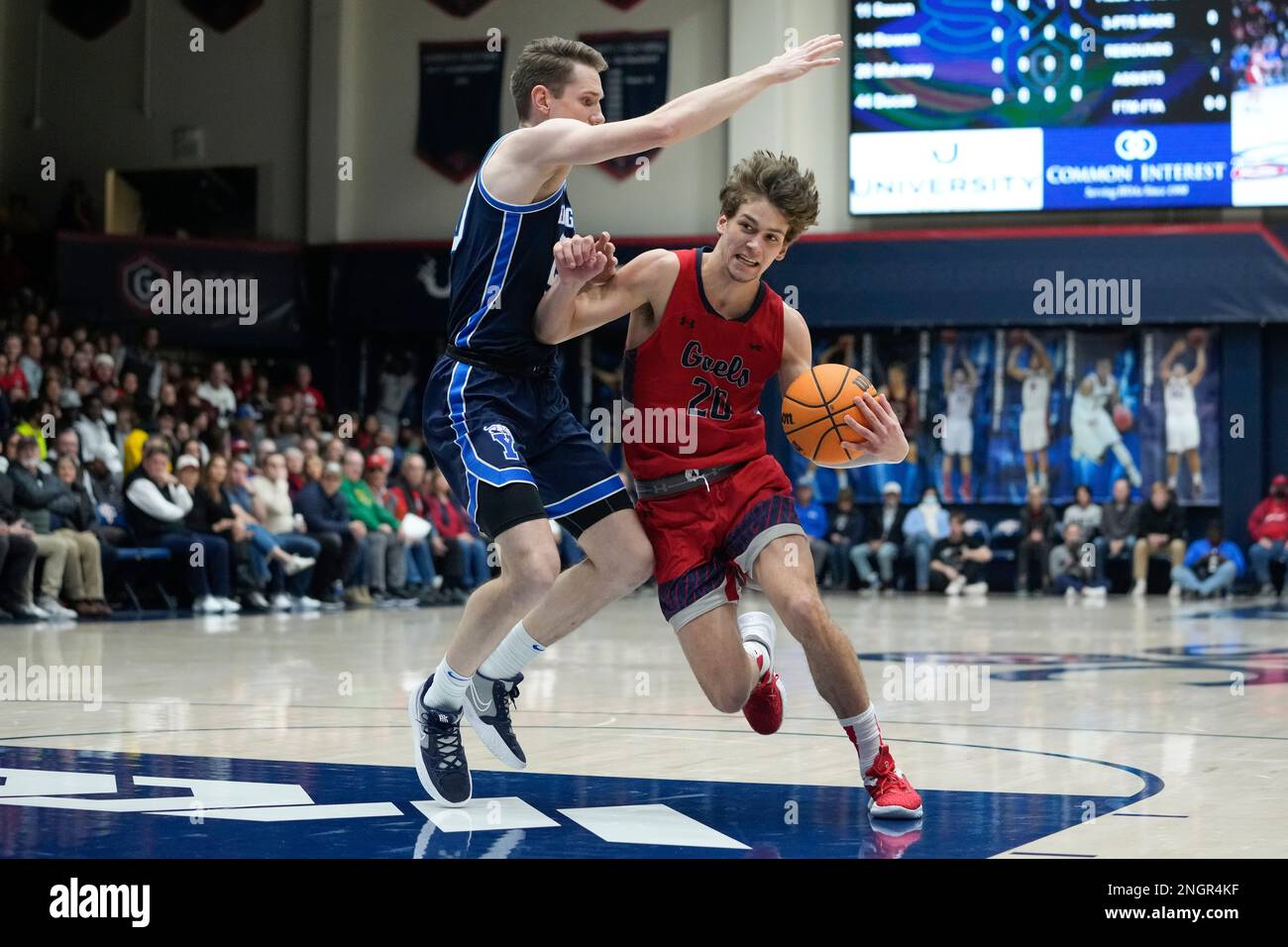 Saint Marys Guard Aidan Mahaney Right Drives To The Basket While