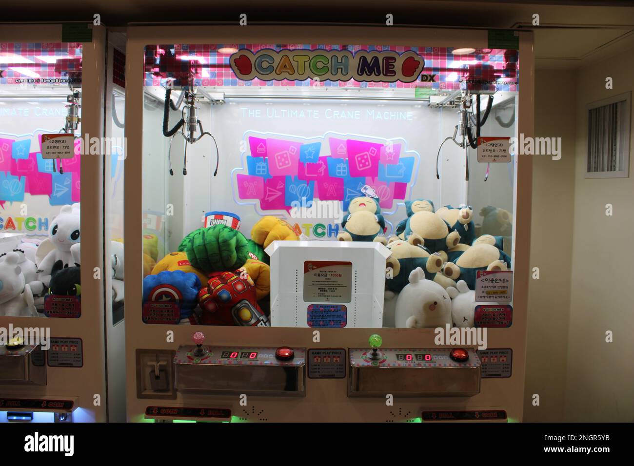 Arcade claw game machines with Pokemon characters Stock Photo Alamy