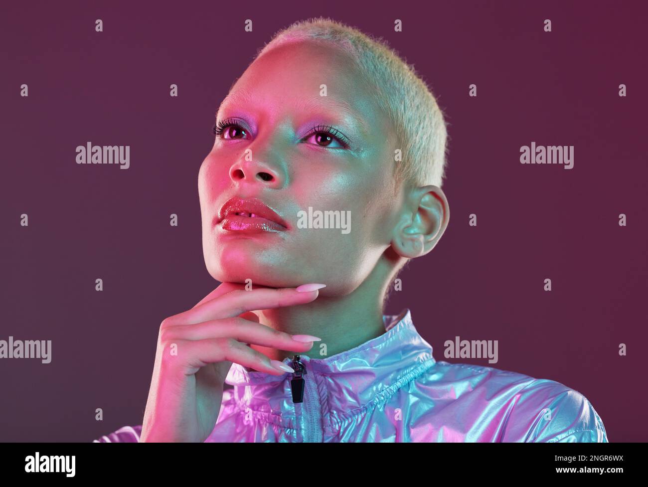Vaporwave style, black woman and cyberpunk aesthetic with model thinking in  a studio. Isolated, glow makeup and futuristic cyber fashion of a young  Stock Photo - Alamy
