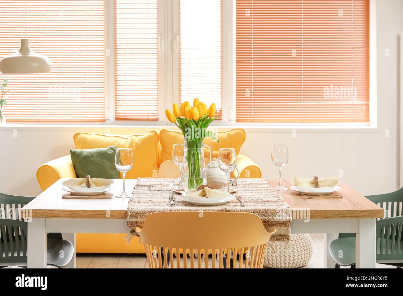 Table setting for International Women's Day celebration with tulip ...