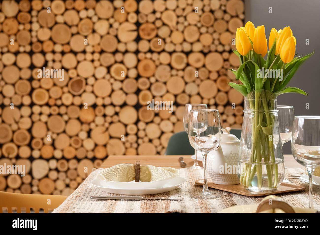 Table setting for International Women's Day celebration with tulip ...