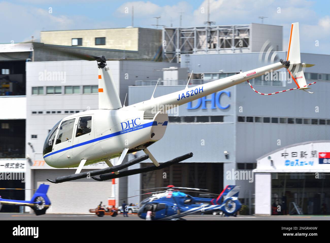 Tokyo, Japan - August 11, 2021: DHC Helicopter Division Robinson R44 Raven II (JA520H) light utility helicopter. Stock Photo