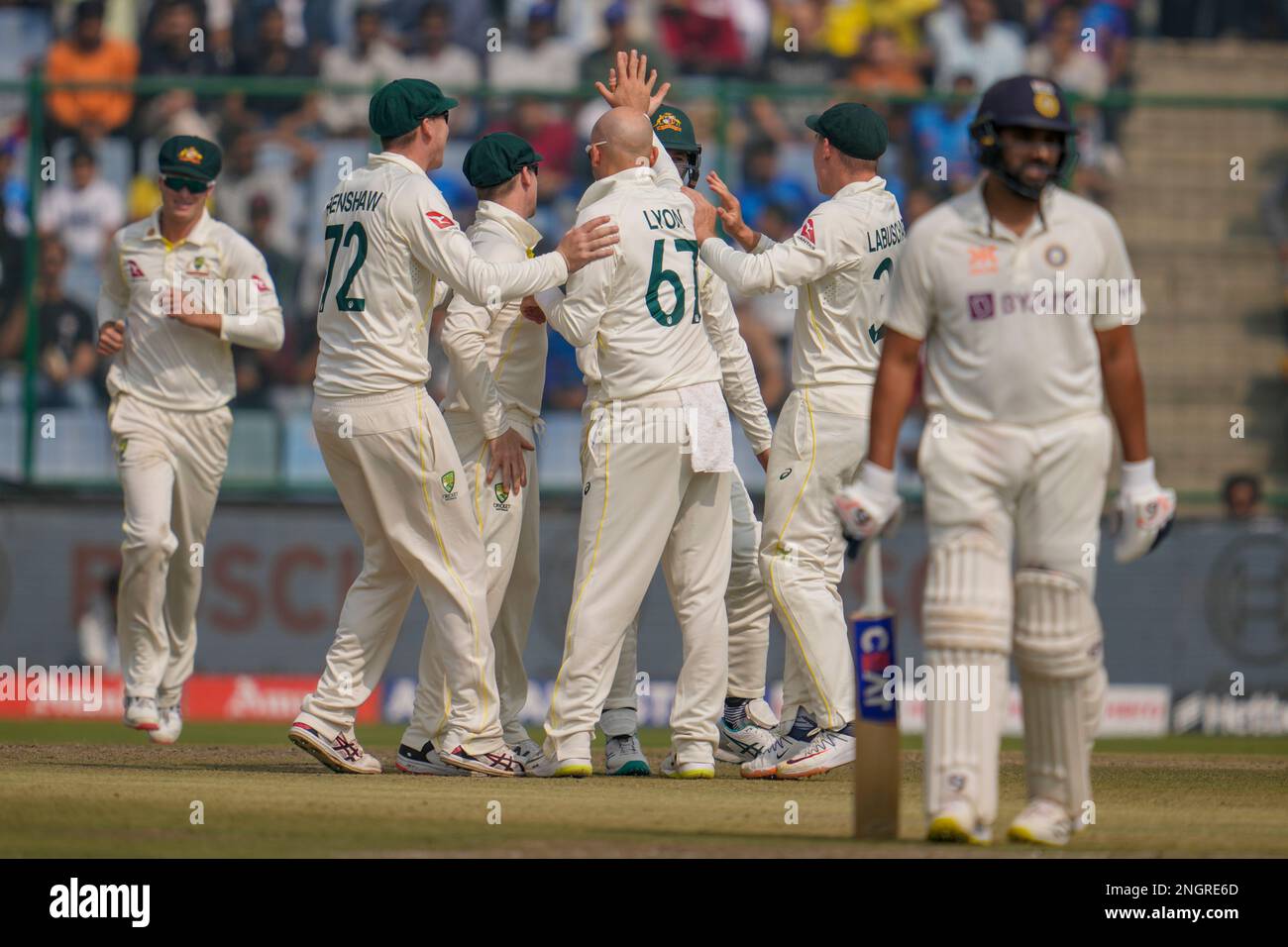 Australian players celebrate dismissal of India's KL Rahul during the ...