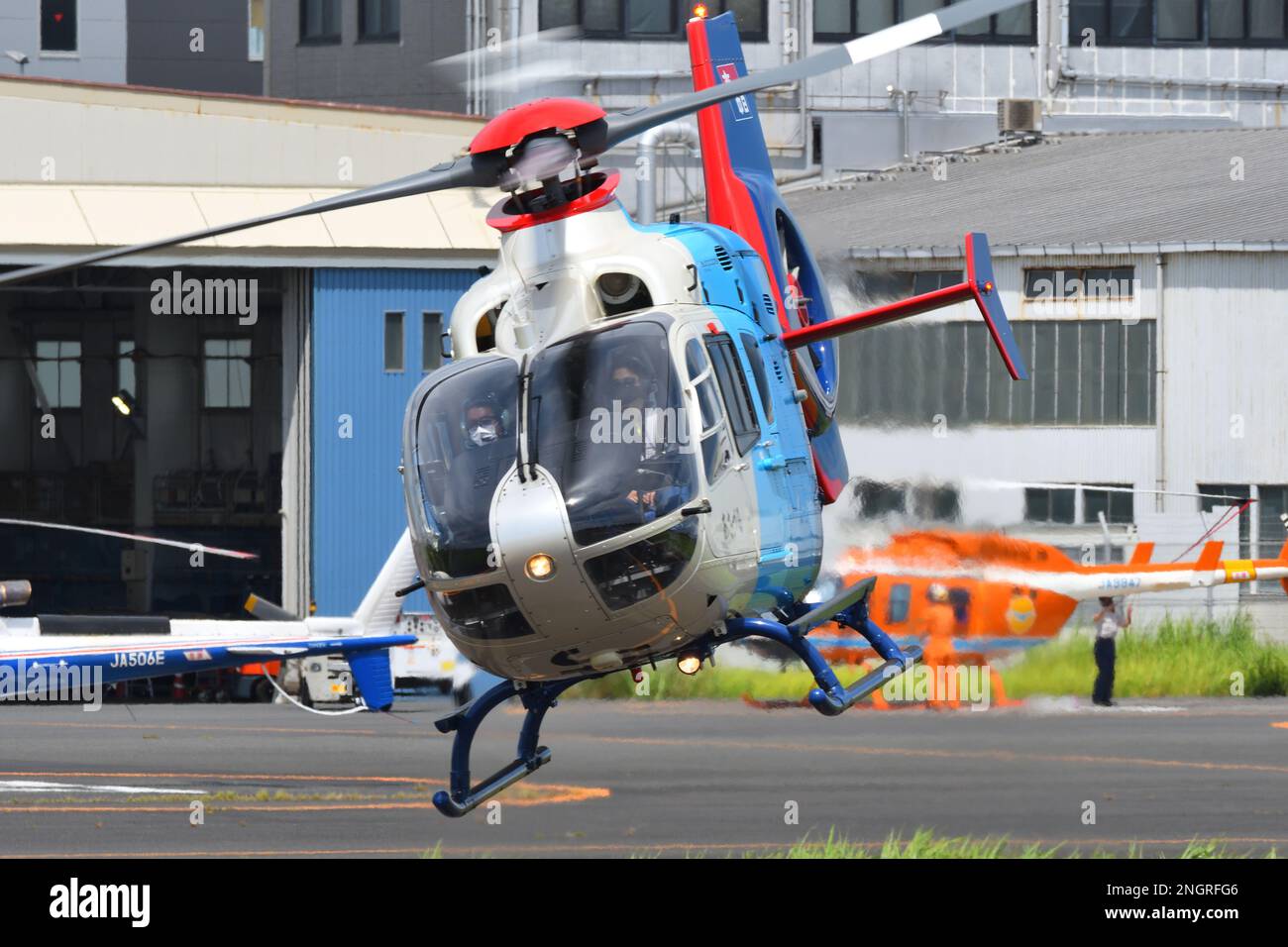 Tokyo, Japan - August 11, 2021: Chunichi Shimbun Eurocopter EC135P2 (JA03CP) light utility helicopter. Stock Photo