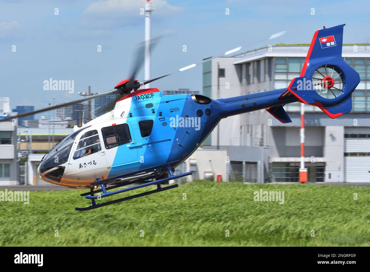 Tokyo, Japan - August 11, 2021: Chunichi Shimbun Eurocopter EC135P2 (JA03CP) light utility helicopter. Stock Photo