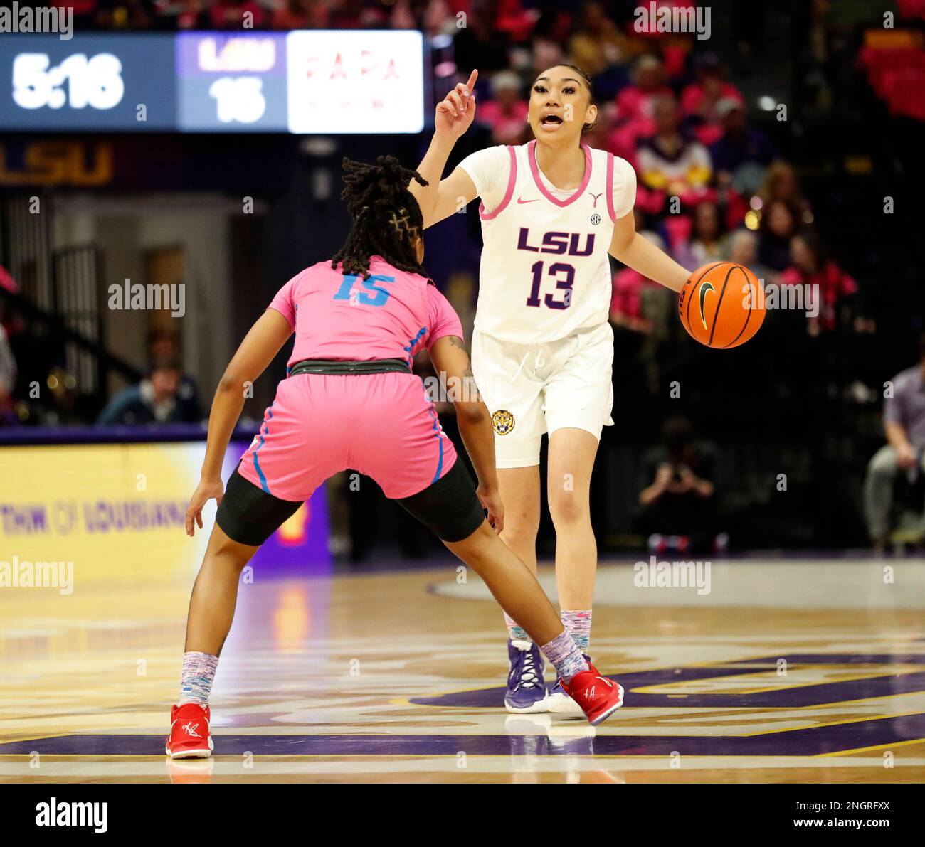 Baton Rouge, USA. 16th Feb, 2023. LSU Lady Tigers guard Last-Tear Poa (13) brings the ball up the court against Ole Miss Rebels guard Angel Baker (15) during a women's college basketball game at the Pete Maravich Assembly Center in Baton Rouge, Louisiana on Thursday, February 16, 2022. (Photo by Peter G. Forest/Sipa USA) Credit: Sipa USA/Alamy Live News Stock Photo