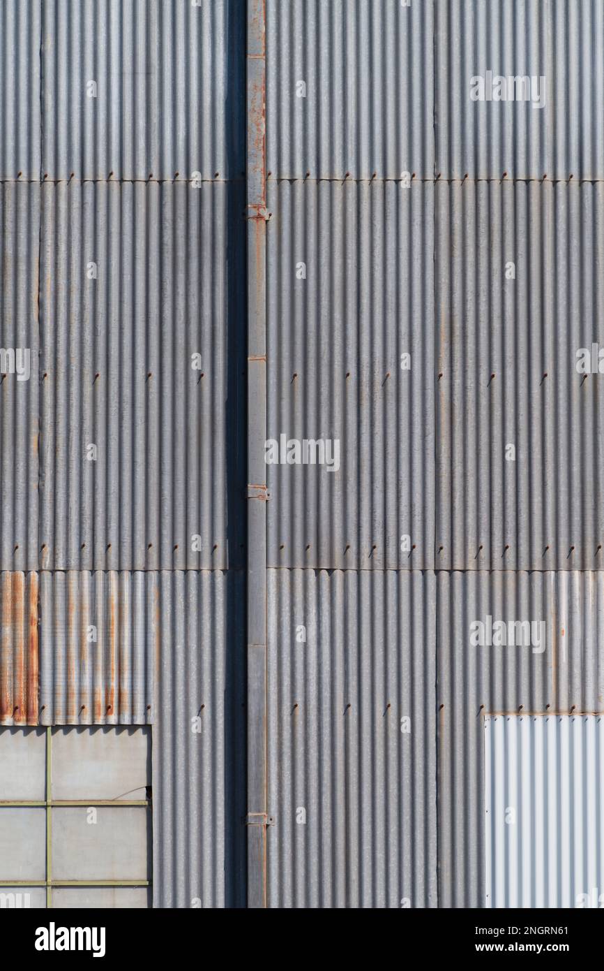 Metal background texture and corrugated iron factory wall in Castlemaine Australia. Stock Photo