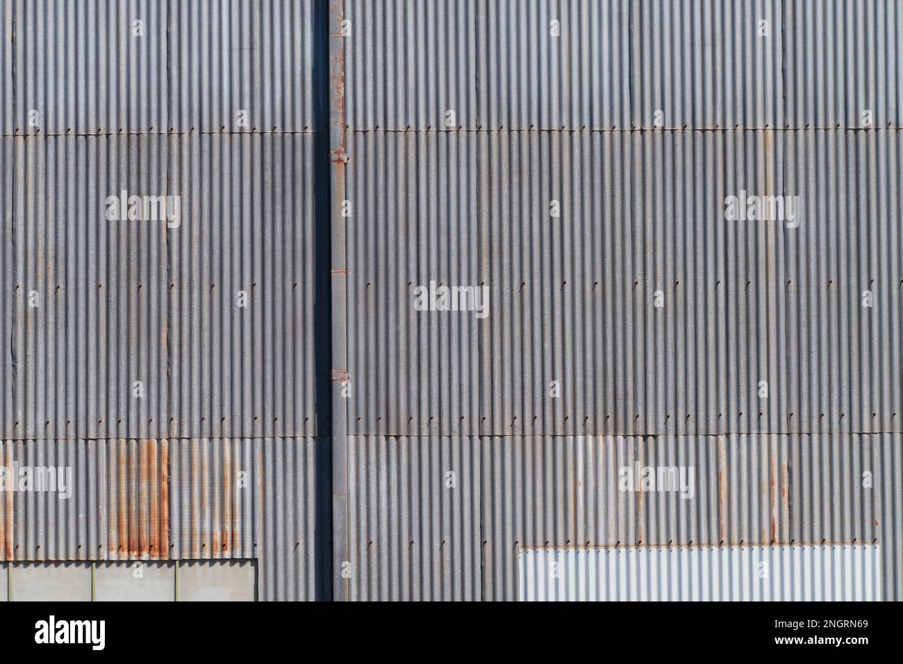 Corrugated iron factory wall and metal texture in Castlemaine Australia. Stock Photo
