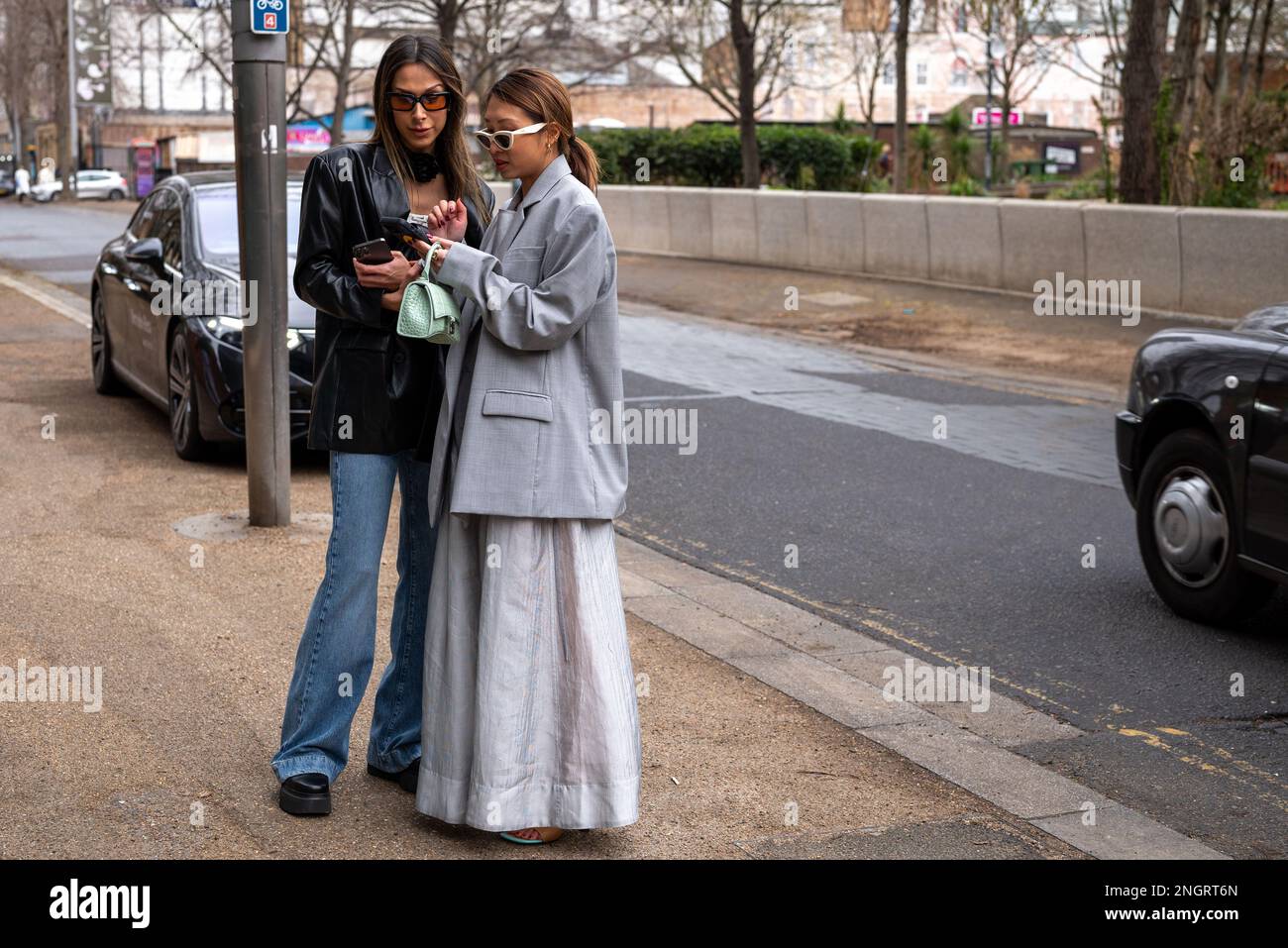 Isabella Charlotta Poppius and Rosie Lai are photographed outside the