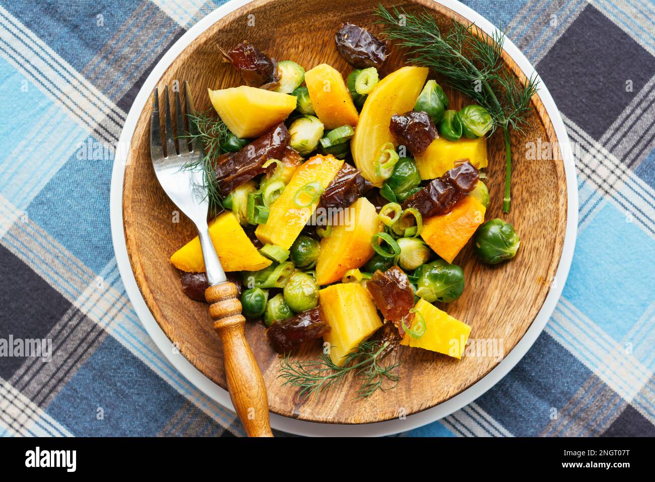 Roasted Yellow Beets with Brussels Sprouts and Dates Stock Photo Alamy