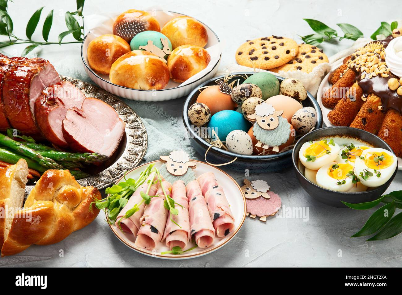 Classic Easter ham dinner. Top view table scene on a white background